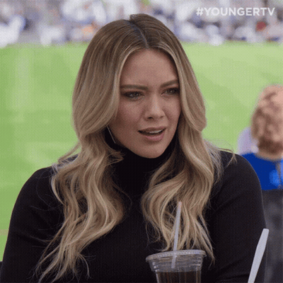 A Woman Drinking From A Plastic Cup With A Straw And The Hashtag #Youngertv On The Bottom GIF