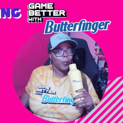 A Woman Drinking From A Yellow Bottle With The Words Game Better With Butterfinger On The Bottom GIF