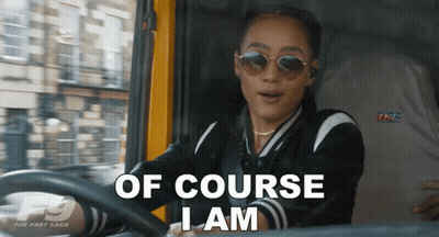 A Woman Driving A Car With The Words Of Course I Am On The Screen GIF