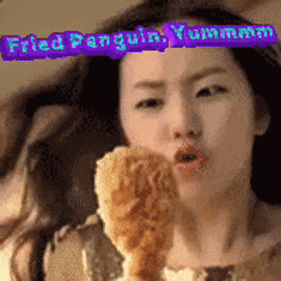 A Woman Eating A Fried Penguin With The Words Fried Penguin Yummy In The Corner GIF