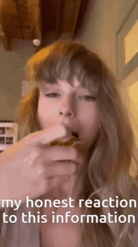 A Woman Eating A Sandwich With The Words " My Honest Reaction To This Information " GIF