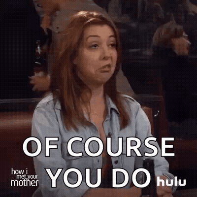 A Woman From How I Met Your Mother Is Sitting At A Table And Making A Face . GIF