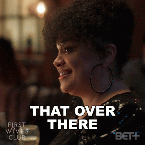 A Woman From The First Wives Club Is Smiling And Saying That Over There GIF
