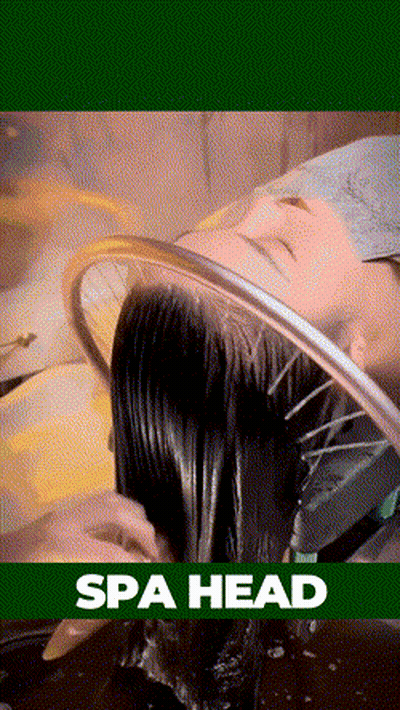 A Woman Getting Her Hair Washed In A Spa Head GIF
