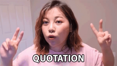 A Woman Giving A Peace Sign With The Word Quotation Written On Her Chest GIF