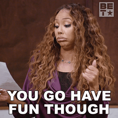 A Woman Giving A Thumbs Up With The Words You Go Have Fun Though Below Her GIF