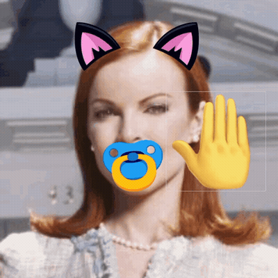 A Woman Has A Pacifier In Her Mouth And A Yellow Hand GIF
