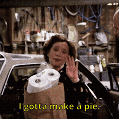 A Woman Holding A Bag Of Toilet Paper Says " I Gotta Make A Pie " GIF