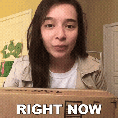 A Woman Holding A Box That Says Right Now On It GIF