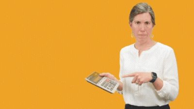 A Woman Holding A Calculator With The Words But Give Me The Cost GIF