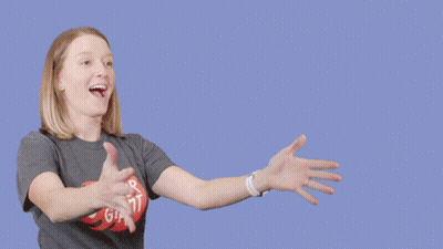 A Woman Holding A Cardboard Box That Says Fragile GIF