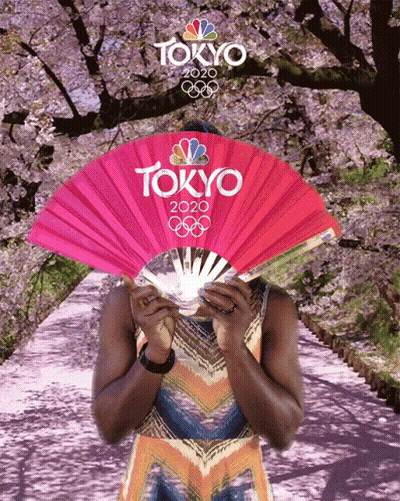 A Woman Holding A Fan That Says Tokyo 2020 GIF