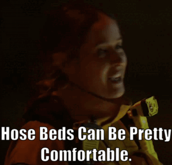 A Woman Holding A Flashlight With The Words Hose Beds Can Be Pretty Comfortable Written Below Her GIF