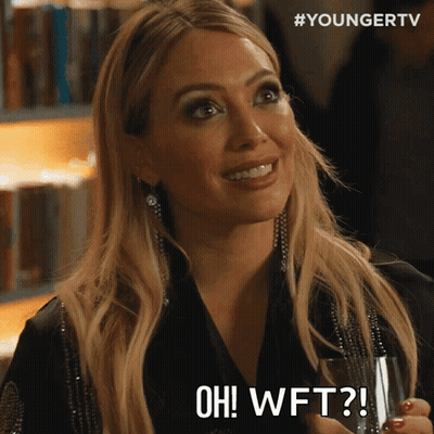 A Woman Holding A Glass With The Words Oh Wft Written On It GIF