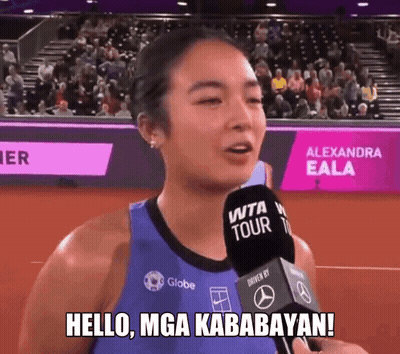 A Woman Holding A Microphone With The Words Hello Mga Kababayan Written On It GIF