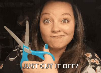 A Woman Holding A Pair Of Scissors With The Words Just Cut It Off Written Below Her GIF