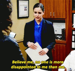 A Woman Holding A Piece Of Paper With The Words " Believe Me No One Is More Disappointed In Me Than Me " GIF