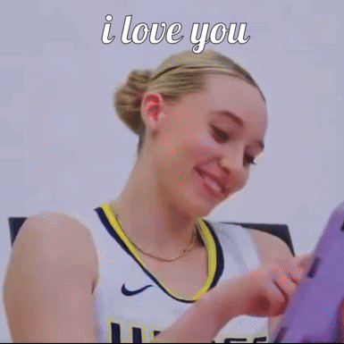 A Woman Holding A Purple Tablet With The Words I Love You Written Above Her GIF