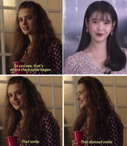 A Woman Holding A Red Cup With The Words " That Smile " On It GIF