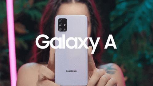 A Woman Holding A Samsung Galaxy A Phone GIF