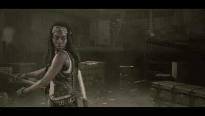 A Woman Holding A Sword With A Red Background Behind Her GIF