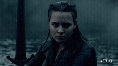 A Woman Holding A Sword With Netflix Written On The Bottom Right GIF
