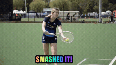 A Woman Holding A Tennis Racquet On A Tennis Court With The Words Smashed It GIF