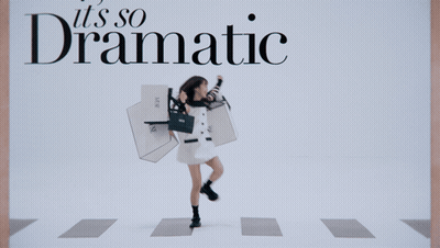 A Woman Holding Shopping Bags With The Words " It 'S So Dramatic " On The Bottom GIF
