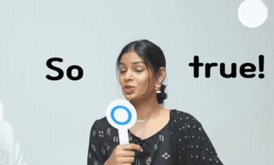 A Woman Holding Up A Sign That Says So True GIF