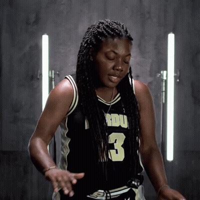 A Woman In A Basketball Jersey With The Number 3 GIF