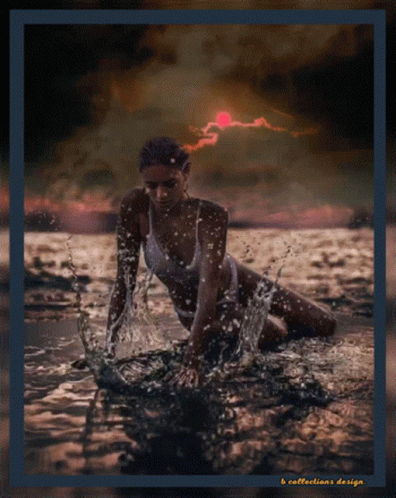 A Woman In A Bathing Suit Is Kneeling In The Water With A Sunset In The Background GIF