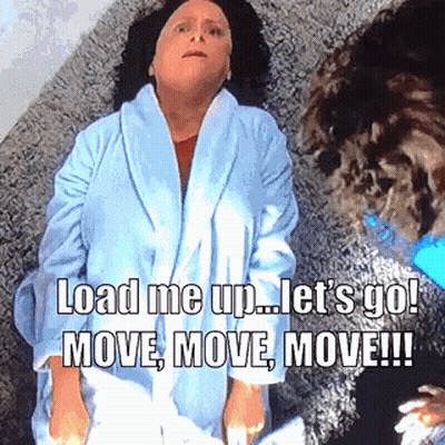 A Woman In A Bathrobe Is Laying On The Floor With The Words " Load Me Up Let 'S Go Move Move Move " GIF