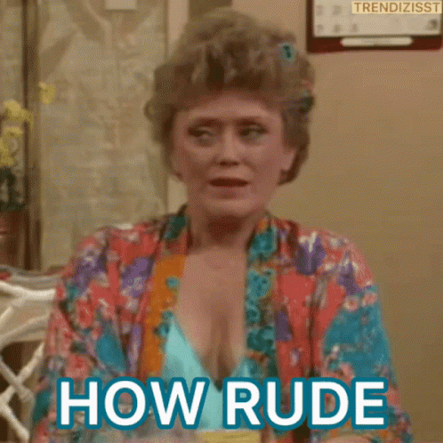 A Woman In A Bathrobe Is Sitting At A Table And Says How Rude . GIF