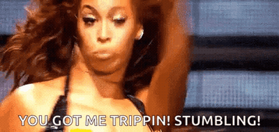 A Woman In A Bikini Is Making A Funny Face And Says `` You Got Me Trippin ! Stumbling ! '' GIF