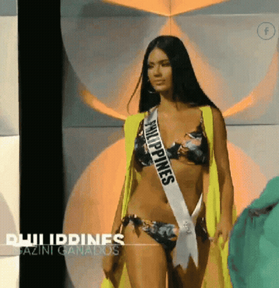 A Woman In A Bikini Wearing A Philippines Sash GIF