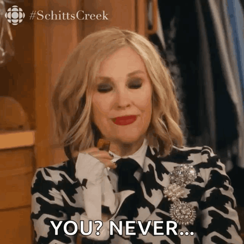A Woman In A Black And White Jacket Says " You ? Never " GIF