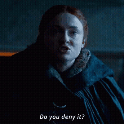 A Woman In A Black Coat Is Asking Do You Deny It . GIF