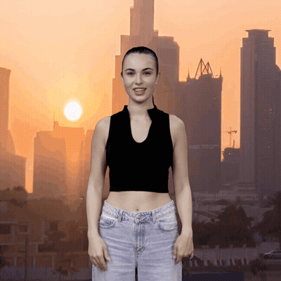 A Woman In A Black Crop Top And Jeans Stands In Front Of A City Skyline GIF