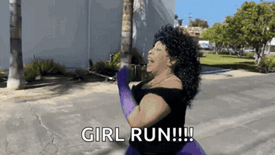 A Woman In A Black Dress And Purple Gloves Is Saying Girl Run GIF