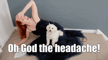A Woman In A Black Dress Is Laying On The Floor Next To A White Dog With The Words Oh God The Headache Written Below Her GIF