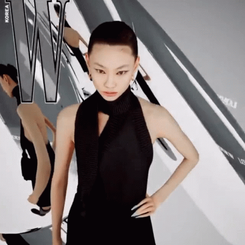A Woman In A Black Dress Is On The Cover Of Korea GIF