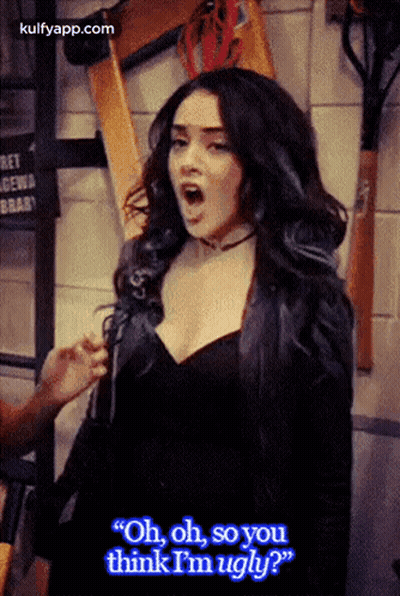 A Woman In A Black Dress Is Saying " Oh Oh So You Think I 'M Ugly " GIF