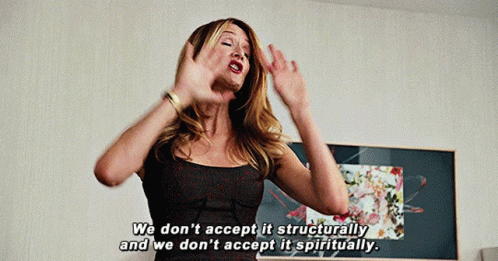 A Woman In A Black Dress Is Saying We Don 'T Accept It Structurally And We Don 'T Accept It Spiritually GIF
