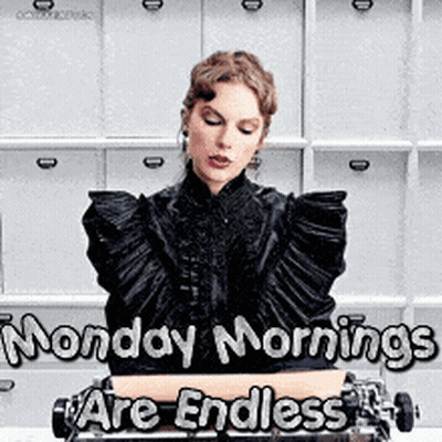 A Woman In A Black Dress Is Sitting In Front Of A Computer With The Words Monday Mornings Are Endless Written On It . GIF