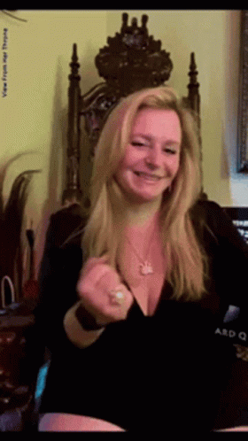 Woman In Black Dress Smiling With Crown GIF