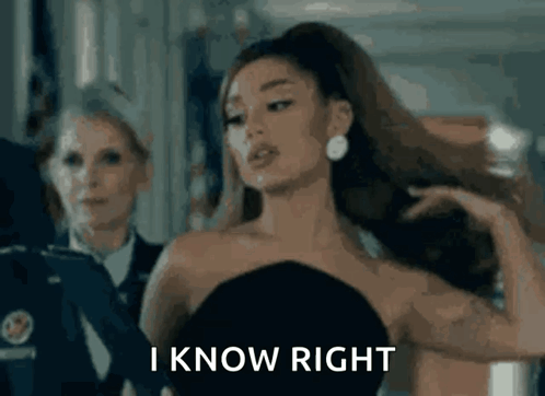 A Woman In A Black Dress Is Standing In Front Of A Group Of Women And Says I Know Right . GIF