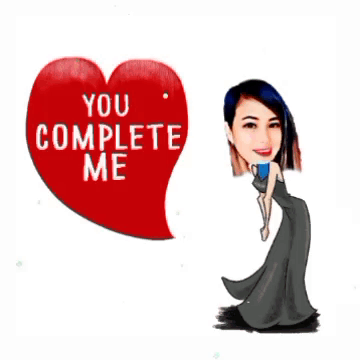 A Woman In A Black Dress Is Standing Next To A Heart That Says You Complete Me GIF