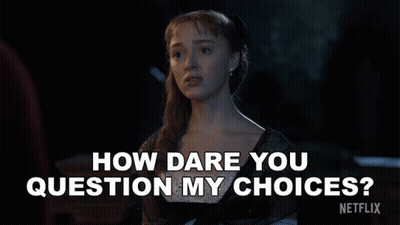 A Woman In A Black Dress Says How Dare You Question My Choices . GIF