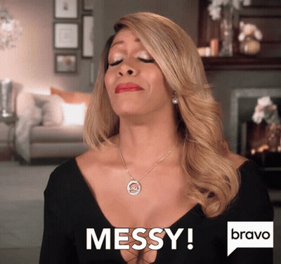 A Woman In A Black Dress Says Messy In A Bravo Ad GIF