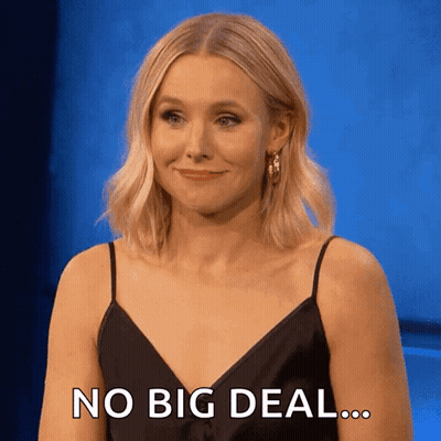 A Woman In A Black Dress Says " No Big Deal " In Front Of A Blue Background GIF